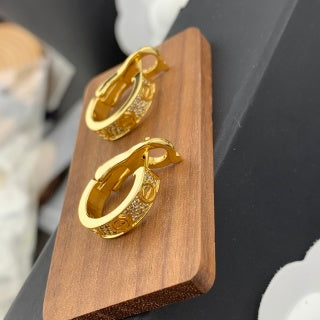 Cartier Marielle Gold Medallion Hoop Earrings